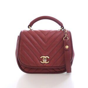 Chanel Mini Lambskin Reversed Round Flap Bag